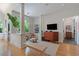 Sun-drenched living room featuring hardwood floors, neutral color scheme, and stylish decor at 872 Euclid Ne Ave, Atlanta, GA 30307