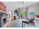 Bright living room with fireplace, modern lighting, and balcony access at 872 Euclid Ne Ave, Atlanta, GA 30307