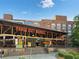 Entrance to Ponce City Market featuring a large sign and steps leading into the building at 872 Euclid Ne Ave, Atlanta, GA 30307