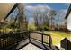 Back deck with scenic views of a lush green lawn and mature trees at 1616 W Kellogg Cir, Douglasville, GA 30134