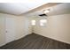 Finished basement with new flooring and two windows providing natural light at 1616 W Kellogg Cir, Douglasville, GA 30134