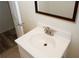Close up of a bathroom vanity featuring a white sink with an updated faucet at 1616 W Kellogg Cir, Douglasville, GA 30134