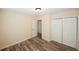 Bedroom with wood flooring and large closet at 1616 W Kellogg Cir, Douglasville, GA 30134