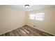 Bedroom with wood flooring and natural light at 1616 W Kellogg Cir, Douglasville, GA 30134