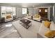 Spacious living room featuring hardwood floors, recessed lighting, and neutral paint at 1616 W Kellogg Cir, Douglasville, GA 30134
