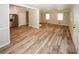 Bright living room features hardwood floors, recessed lighting, and staircase access at 1616 W Kellogg Cir, Douglasville, GA 30134