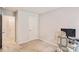 This carpeted bedroom features neutral walls, a door to the hallway, and is perfect for a home office or play space at 3565 Brycewood Dr, Decatur, GA 30034