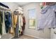 Spacious walk-in closet with ample shelving and storage for clothing and accessories at 3565 Brycewood Dr, Decatur, GA 30034