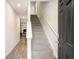 Bright entry hallway with stairs and views into the living area at 3565 Brycewood Dr, Decatur, GA 30034