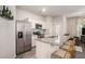 Modern kitchen features stainless steel appliances, granite countertops, and bar seating at 3565 Brycewood Dr, Decatur, GA 30034