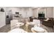 Open-concept living space with modern furniture and bright lighting, ideal for entertaining at 3565 Brycewood Dr, Decatur, GA 30034
