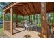 A cozy gazebo furnished with seating, perfect for outdoor relaxation and entertaining at 3919 Mccullers Rd, Loganville, GA 30052