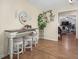 Cozy living area with a breakfast bar, and view into the main living room at 3919 Mccullers Rd, Loganville, GA 30052