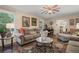 Comfortable living room featuring neutral furniture, area rug, and natural light at 3919 Mccullers Rd, Loganville, GA 30052