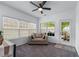 Sun room with neutral colors, carpet, and large windows for natural light at 6045 Park Close, Fairburn, GA 30213