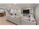 Finished basement featuring a full bar, entertainment area and large sofa at 2685 Grady Se St, Smyrna, GA 30080