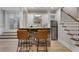 Finished basement with a stone bar, leather chairs and stainless appliances at 2685 Grady Se St, Smyrna, GA 30080