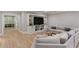 Open basement with a media center, a large sofa, and recessed lighting at 2685 Grady Se St, Smyrna, GA 30080