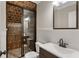 Bathroom featuring a modern vanity and shower with decorative tile work at 2685 Grady Se St, Smyrna, GA 30080
