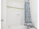 Bathroom featuring a tiled shower/tub combination and a modern shower curtain at 2685 Grady Se St, Smyrna, GA 30080