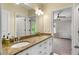 Bathroom features dual sinks, a large mirror, and access to another room at 2685 Grady Se St, Smyrna, GA 30080