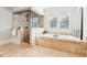 Bathroom featuring a separate shower and tub at 2685 Grady Se St, Smyrna, GA 30080