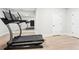 Bright exercise room with a treadmill, mirrors, and natural light at 2685 Grady Se St, Smyrna, GA 30080