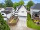 Back exterior view of a two-story home with a well-manicured lawn at 2685 Grady Se St, Smyrna, GA 30080