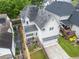Back exterior view of a two-story home with a well-manicured lawn at 2685 Grady Se St, Smyrna, GA 30080