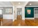 Hallway features hardwood floors and neutral paint throughout at 2685 Grady Se St, Smyrna, GA 30080