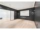 A spacious home theater includes a large screen, speaker system, and recessed lighting for immersive movie nights at 2685 Grady Se St, Smyrna, GA 30080