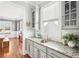 Charming kitchenette featuring granite countertops, gray cabinets, and modern finishes at 2685 Grady Se St, Smyrna, GA 30080