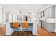 Bright kitchen featuring island with stainless steel appliances, granite counters, and breakfast bar at 2685 Grady Se St, Smyrna, GA 30080
