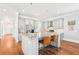 Bright kitchen featuring island with stainless steel appliances, granite counters, and breakfast bar at 2685 Grady Se St, Smyrna, GA 30080