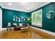 Cozy living room with a leather sofa, a small coffee table, and bold paint, perfect for relaxing at 2685 Grady Se St, Smyrna, GA 30080