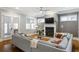 Comfortable living room features a fireplace, ceiling fan and doors to the outside at 2685 Grady Se St, Smyrna, GA 30080
