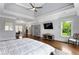 Large main bedroom featuring hardwood floors, tray ceilings, and a separate office area at 2685 Grady Se St, Smyrna, GA 30080