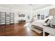Spacious main bedroom with tray ceiling, hardwood floors, and a large window at 2685 Grady Se St, Smyrna, GA 30080