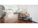 Open main bedroom with dark wood floors, desk, and natural lighting at 2685 Grady Se St, Smyrna, GA 30080