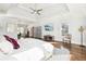 Airy main bedroom with tray ceiling, hardwood floors, and ample natural light at 2685 Grady Se St, Smyrna, GA 30080