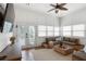 Bright sun room with lots of natural light, ceiling fan and doors to the outside at 2685 Grady Se St, Smyrna, GA 30080
