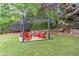 Outdoor living space with chairs under a pergola, offering an ideal spot for relaxation at 452 Brushstroke Se Ct, Marietta, GA 30067