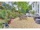 Inviting backyard patio area featuring a table and chairs perfect for outdoor dining and relaxation at 452 Brushstroke Se Ct, Marietta, GA 30067