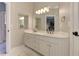 Bathroom with double sink vanity, large mirror, and bright lighting at 452 Brushstroke Se Ct, Marietta, GA 30067