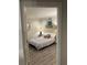 Comfortable bedroom with modern flooring, neutral walls, and stylish decor creates a welcoming space at 452 Brushstroke Se Ct, Marietta, GA 30067