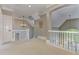 Hallway features white railings, a chandelier, and offers an open view to the first floor at 452 Brushstroke Se Ct, Marietta, GA 30067