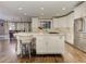 Modern kitchen features white cabinets, stainless appliances and center island with seating at 452 Brushstroke Se Ct, Marietta, GA 30067