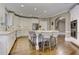 Bright kitchen with white cabinetry, large center island and stainless appliances at 452 Brushstroke Se Ct, Marietta, GA 30067
