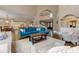 Spacious living room with open floor plan, hardwood floors, comfortable seating, and views of dining and kitchen at 452 Brushstroke Se Ct, Marietta, GA 30067