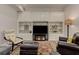 Bright living area featuring custom built-ins, a TV, and plush seating, perfect for Gathering gatherings at 452 Brushstroke Se Ct, Marietta, GA 30067